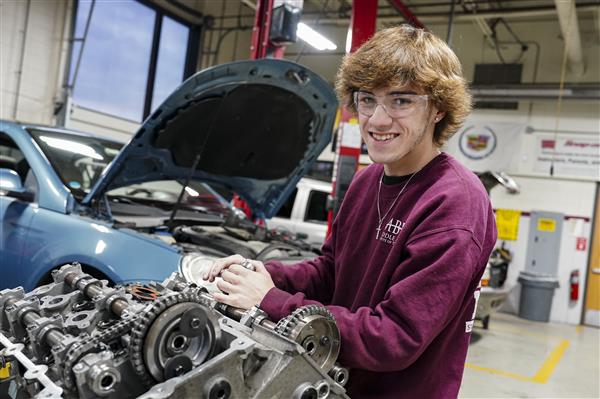 Automotive Technology student working on cars